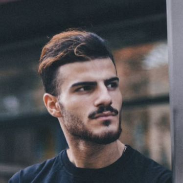 Young man looking away portrait